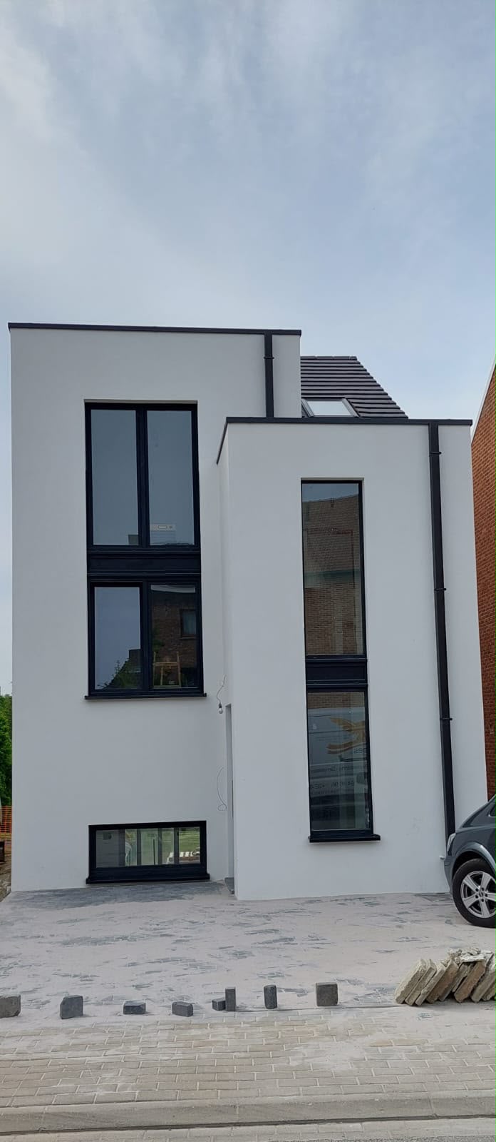 Maison neuve en enduit blanc